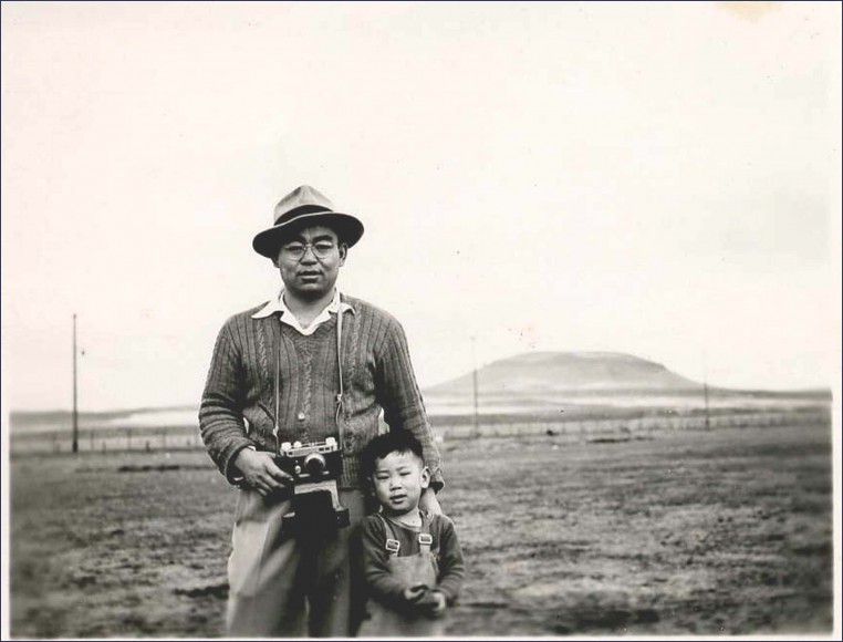 Hiroshi Shimizu with his father Iwao Shimizu in Tule Lake Segregation Center, where he renounced his U.S citizenship, along with over 5,000 other Japanese Americans protesting their incarceration. March 18, 1946. Photo by Fusako Shimizu, courtesy of "Resistance at Tule Lake," directed by Konrad Aderer. 