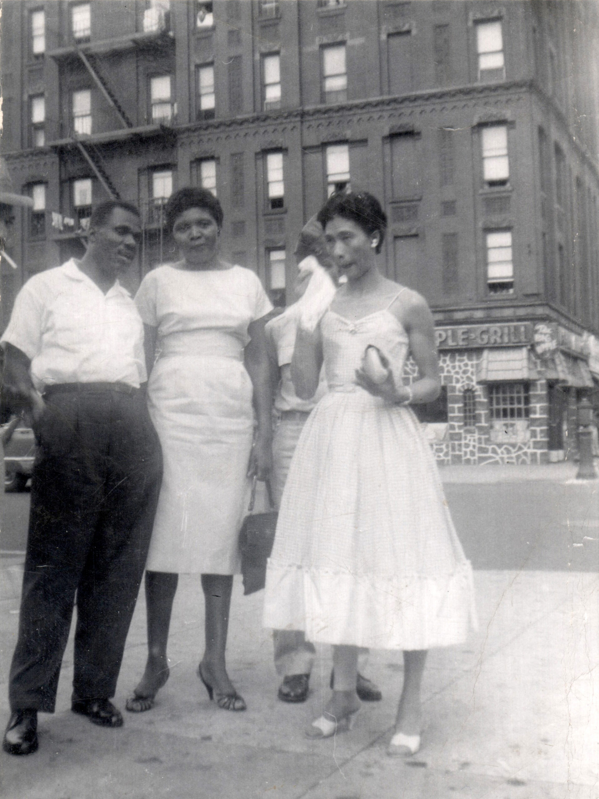 145th Street in Harlem -- Cousin George Barnes, Paula Madison's dad's first cousin, who sometimes rented a room in their small apartment. He was the only relative she consistently saw and he protected and loved us. Madion's Mom, right, holding the handkerchief. She likely made her beautiful dress.