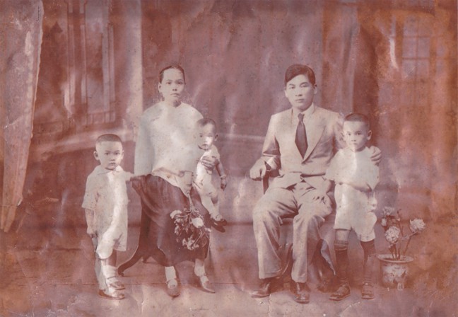 China c. 1929 -- A Lowe Family portrait taken with Samuel Lowe (Lowe Ding Chow), sons Chow Woo, Chow Kong and Chow Ying, and his wife, Ho Swee Yin.