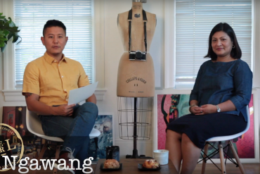 A Tibetan American man interviews a Nepalese American woman on a talk show.