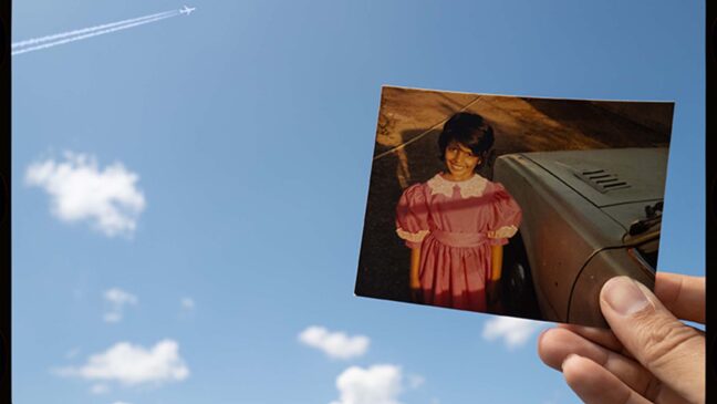picture being hold up in the sky
